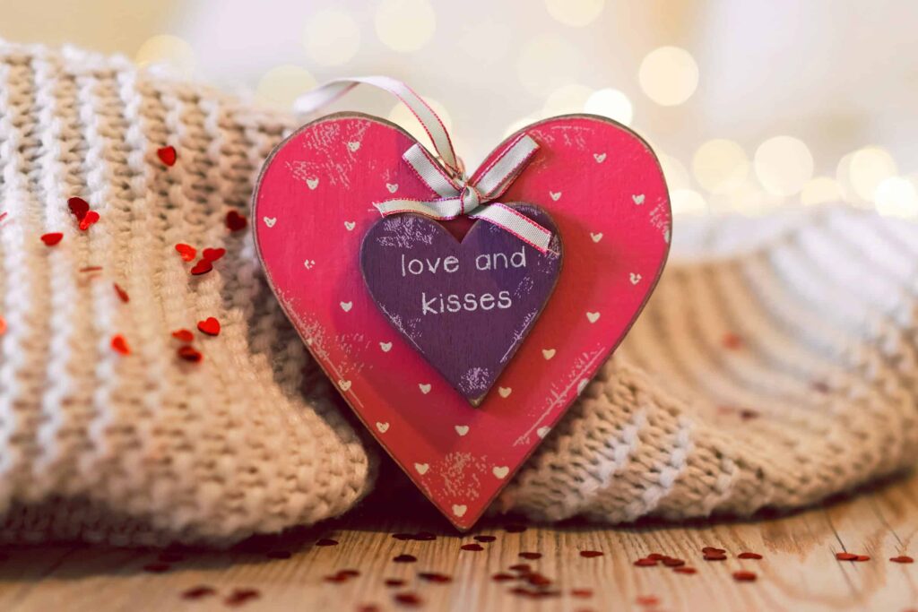 nested wooden heart valentine gift with love and kisses message